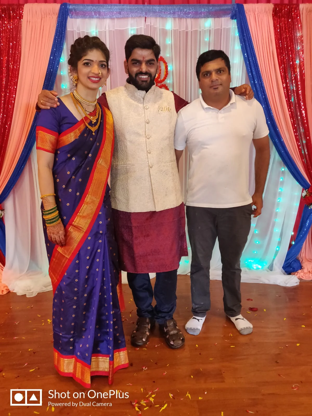 Guests in front of decorated stage